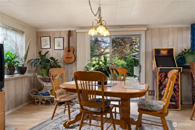 Dining room has a sliding glass door to the front of the house.