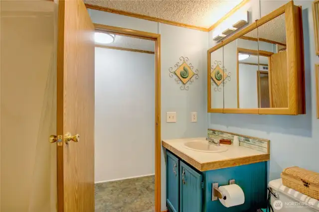 Second bath with access to the hallway.