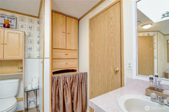 Behind the bathroom door was a stand alone shower. Pipes and drain are still there to return it to a shower.