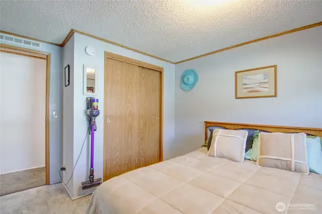 Spare room with closet.