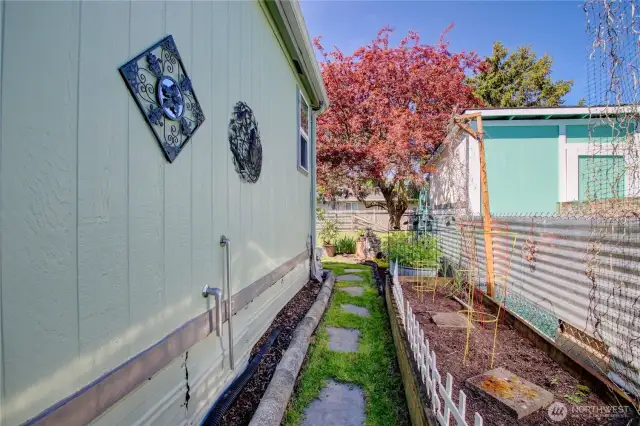 Garden area and manicured pathway.