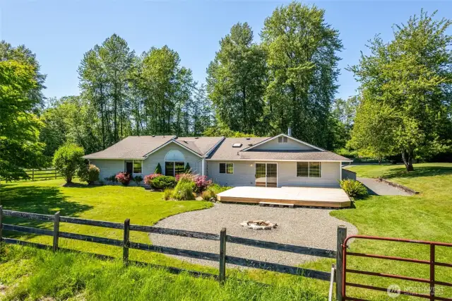Back of home showing the firepit.