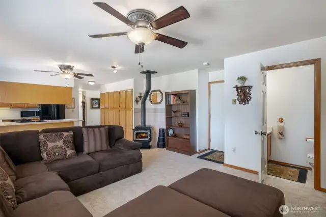 Family room with half bathroom