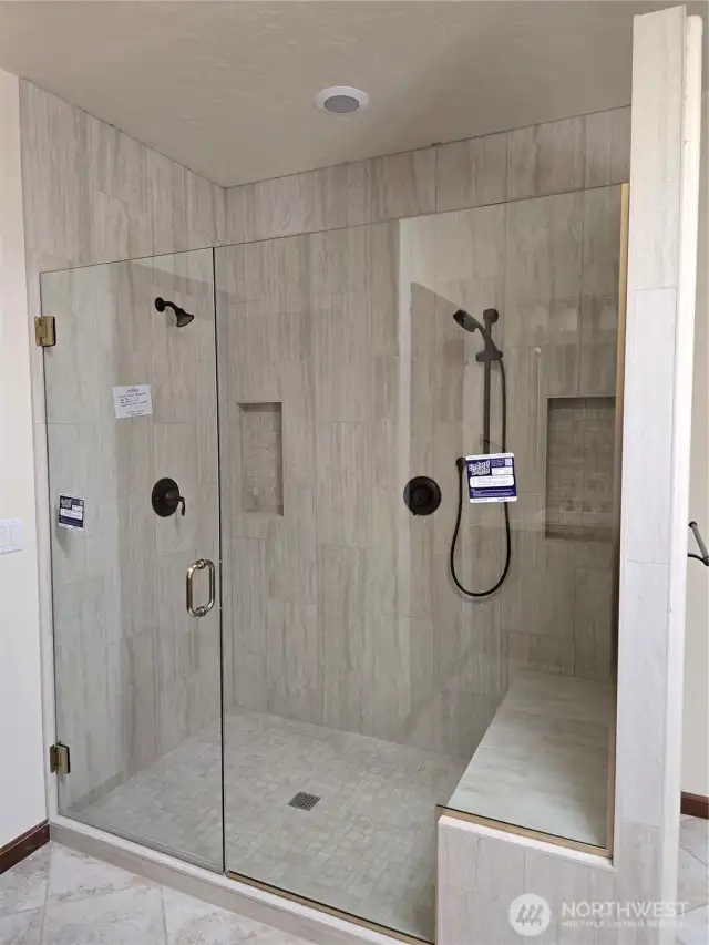 Custom Walk-in shower, multiple heads and cubbies!