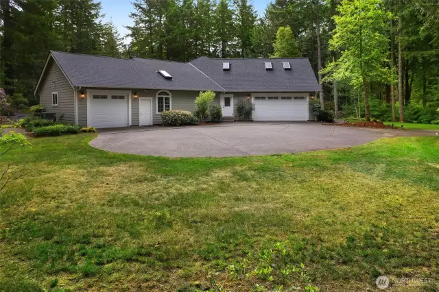 2 oversized attached garages - separated for convenience.