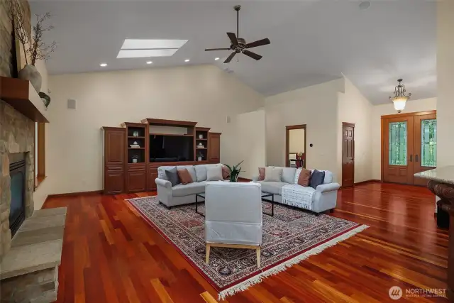 Enter the Great room.  Enjoy the expanse of rich Cherry floors.