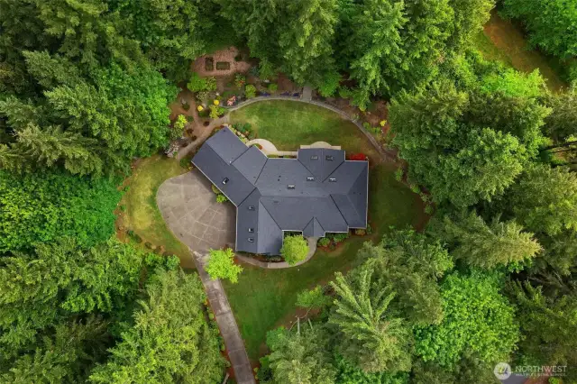 The treed lot provides plenty of privacy.