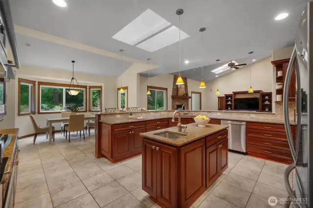 Well designed Island and Peninsula Kitchen - stone and stainless!