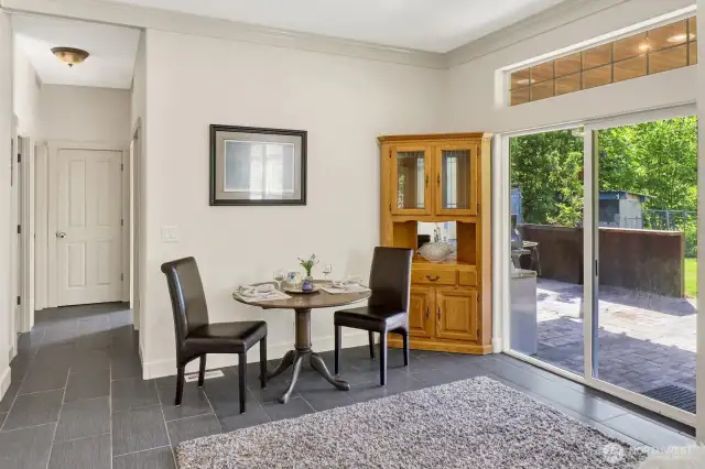 Dining area leading out to the back patio, which is covered too!