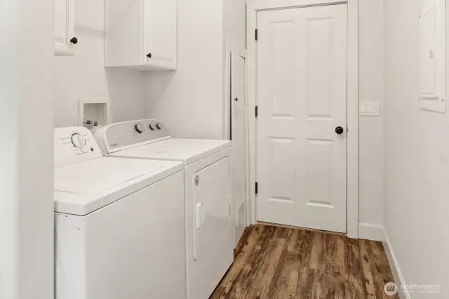 Large utility room leads out to the garage.