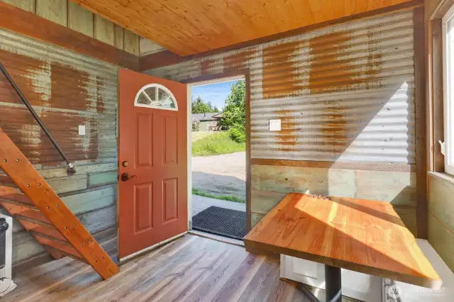 Looking toward the entrance to the tiny home: stairway on left leads to the loft.