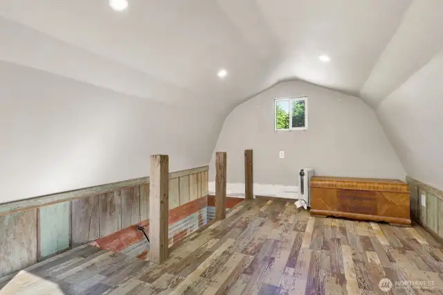 Large tiny home loft showing railing that can easily be completed.