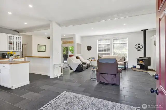 As you step through the front door you are welcomed into the open concept kitchen and living area.