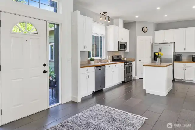 Looking back at the entrance you will notice the porcelain wood-look flooring.
