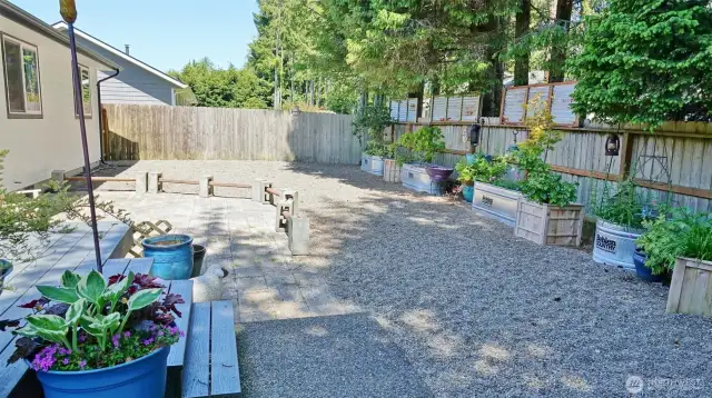 Fenced Backyard w/ Deck and paver Patio.