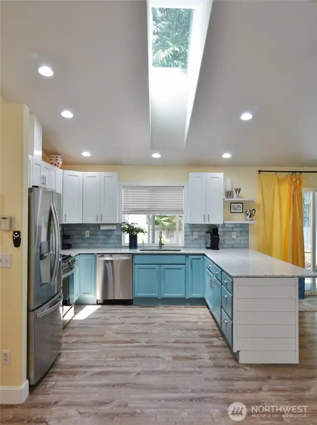 Kitchen w/ skylight.