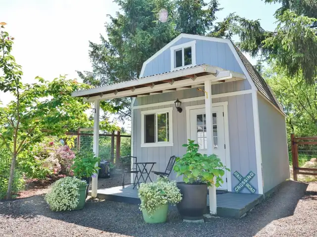12'x16' Tuff Shed w/ porch and 30-amp power.
