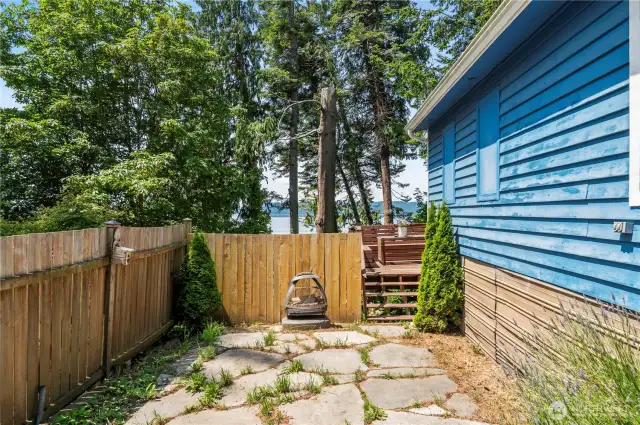 Fully enclosed side yard has been boat and RV storage and firepit delights.