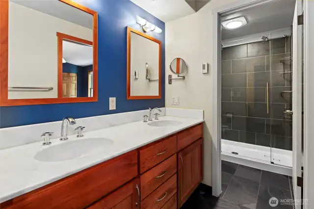 Primary bathroom, 2 sinks and walk in shower.  Large bathroom vanity with plenty of drawer space.