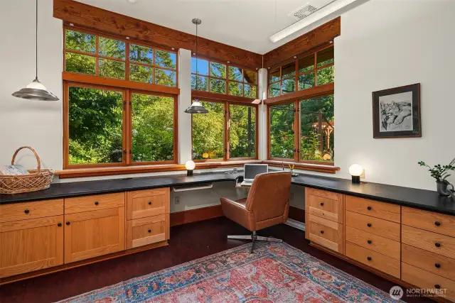 Separate yet connected by the entry breezeway, additional office with built-ins and views