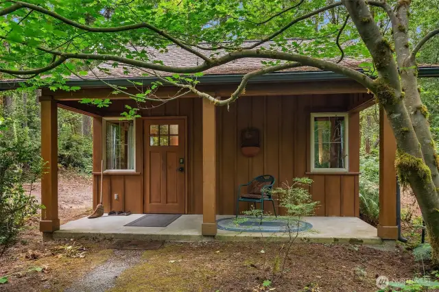 Private guest cottage in the woods behind the main home