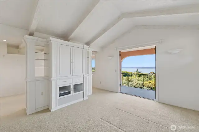 Primary suite with sweeping sound and mountain views and a private deck