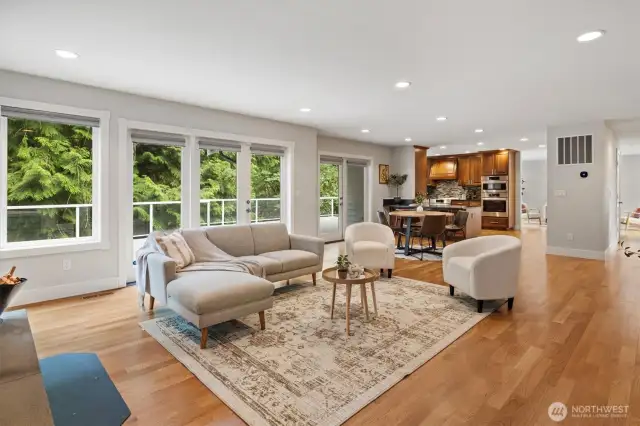 Open concept on the main floor - living room flows to dining space to kitchen to living room and you can see all the way through