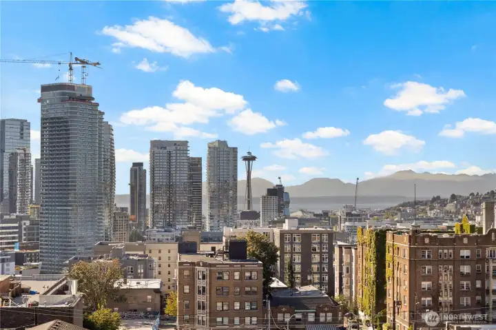 Gorgeous views and sunsets from these three west facing balconies. Space Needle, Puget Sound/Elliott Bay & Olympic mountain range.