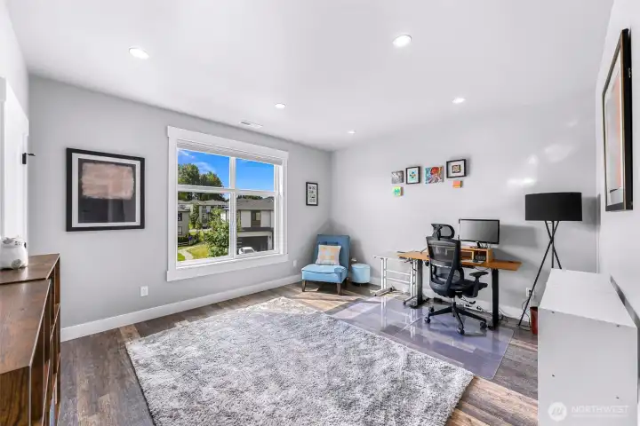 Third upstairs large bedroom with another south facing window with Baker views.