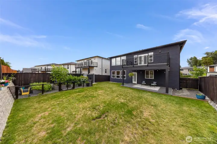 Great yard space and established gardening area.