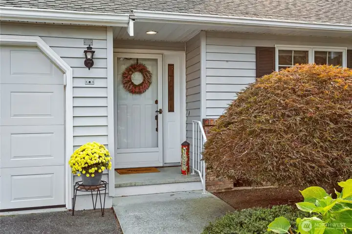 Covered & inviting front entry