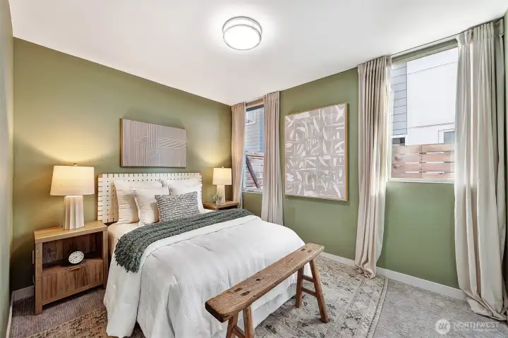 Lower level includes two full-size bedrooms.