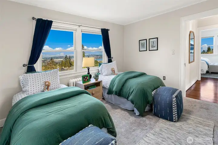 This is one of three bedrooms on the second floor. This one enjoys views of Mt. Baker, Lake Washington and Interlaken Park.