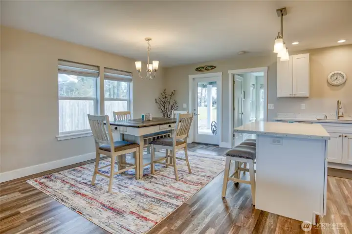 Note the patio door that exits to the backyard. Primary en-suite is through the door on right side.