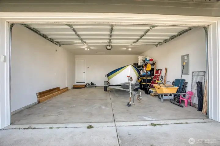 Boat does not convey. Lots of room in this 2 car garage.