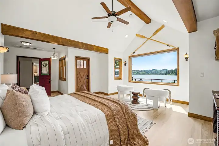 Rich Wood Beams Compliment the Main Floor Primary Suite
