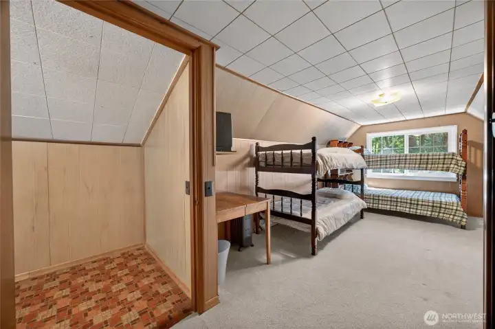 Upstairs bedroom.  The bunk beds stay!