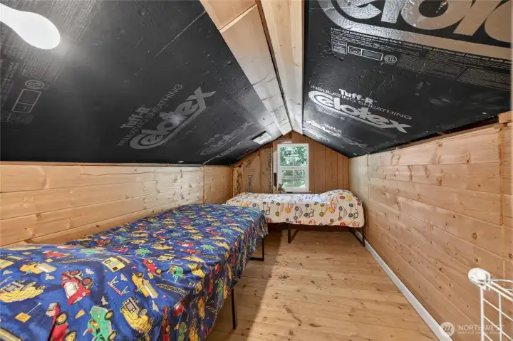 Room for two beds in this super secret attic hide-away.
