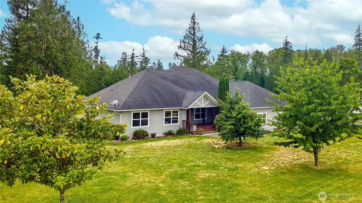 Front left of home, mature landscape & cherry tree, welcoming front deck. Seller is refinishing front deck so you won't have to! Front left of home, mature landscape & cherry tree, welcoming front deck. Seller is refinishing front deck so you won't have to!
