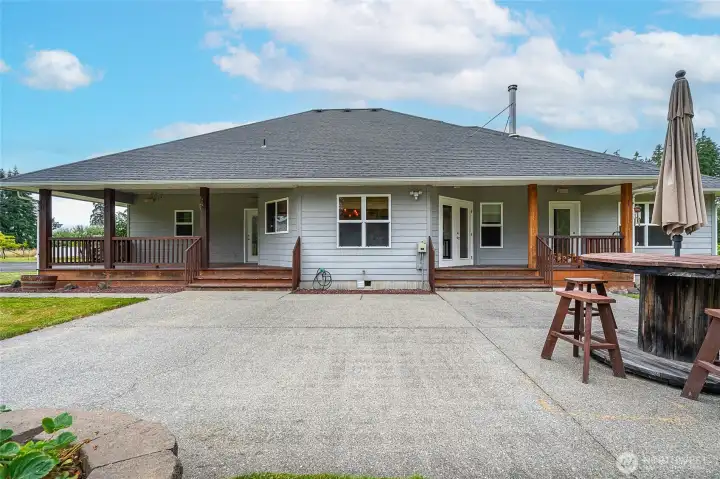 2 separate covered decks and a patio. 2 separate covered decks and a patio.