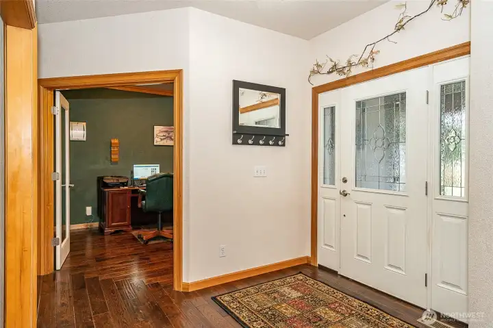 Welcome in! A warm and inviting entrance for your friends and family. Den/office space to the right of the front door. Welcome in! A warm and inviting entrance for your friends and family. Den/office space to the right of the front door.