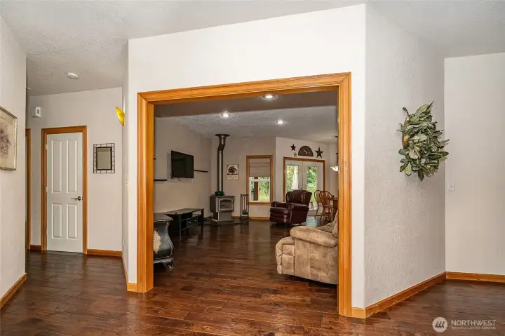 Straight ahead is the entrance to the open floor plan living, dining and kitchen. Straight ahead is the entrance to the open floor plan living, dining and kitchen.