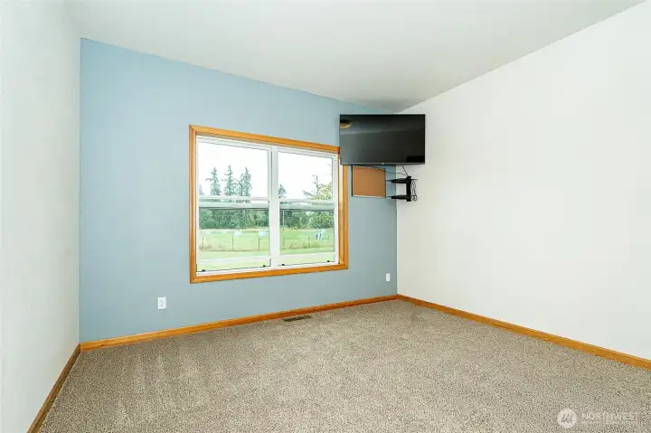 Bedroom #3 bedrooms and bonus room all have brand new neutral colored carpet. Large windows bring in lots of natural light with a view of the front yard and pasture. Bedroom #3 bedrooms and bonus room all have brand new neutral colored carpet. Large windows bring in lots of natural light with a view of the front yard and pasture.