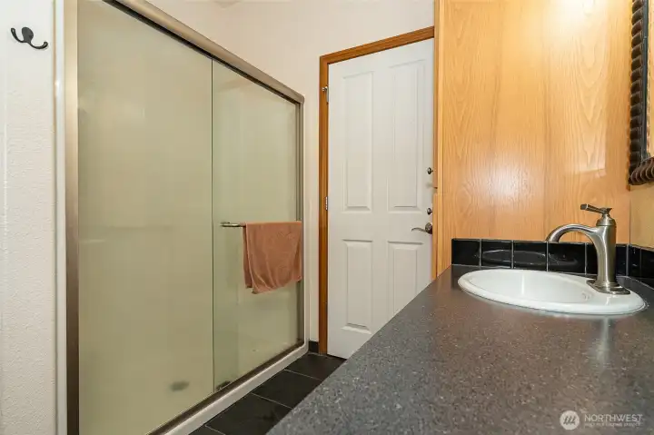 Main bathroom shower with low clearance entry. Main bathroom shower with low clearance entry.