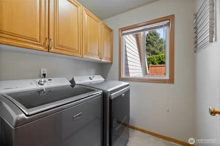 Laundry Room Includes the Washer & Dryer