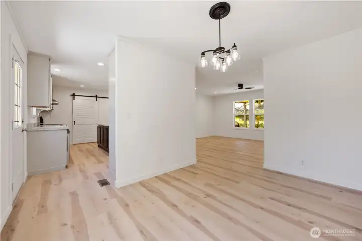 A designated dining room is conveniently adjacent to the kitchen and living room for easy entertaining.