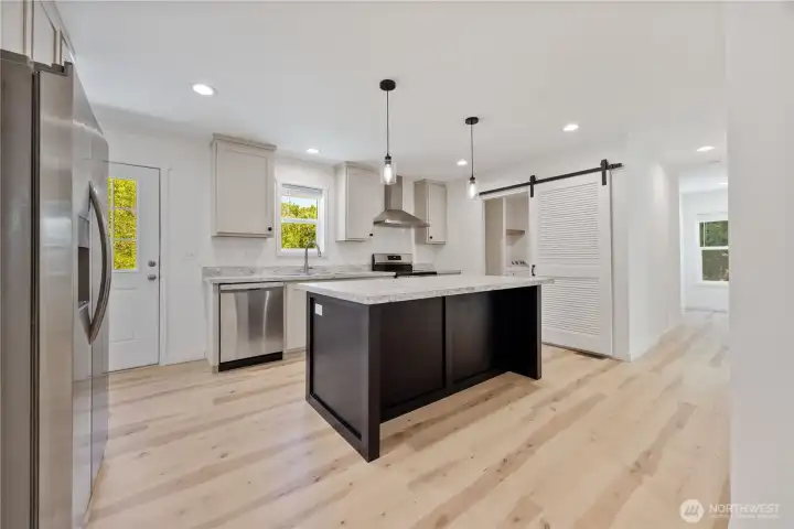 A well appointed kitchen island for informal visiting and meals.