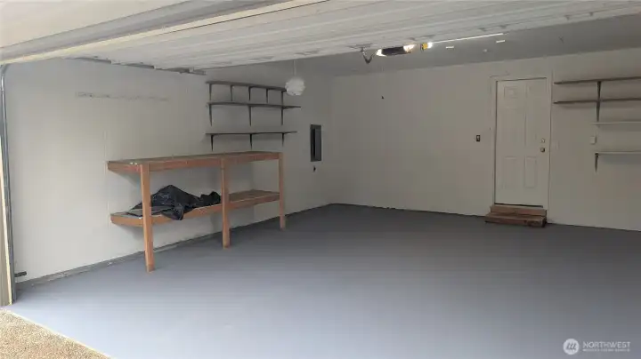 Garage with garage door opener.