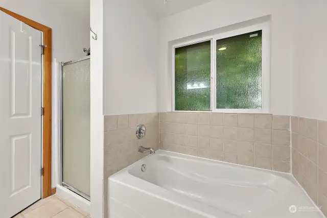 Full bathtub and separate shower.