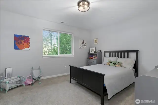 Secondary bedroom is thoughtfully laid out. Closet is on wall shared with other secondary bedroom. Other wall is shared with primary bedroom bathroom. Provides maximum privacy for all occupants.